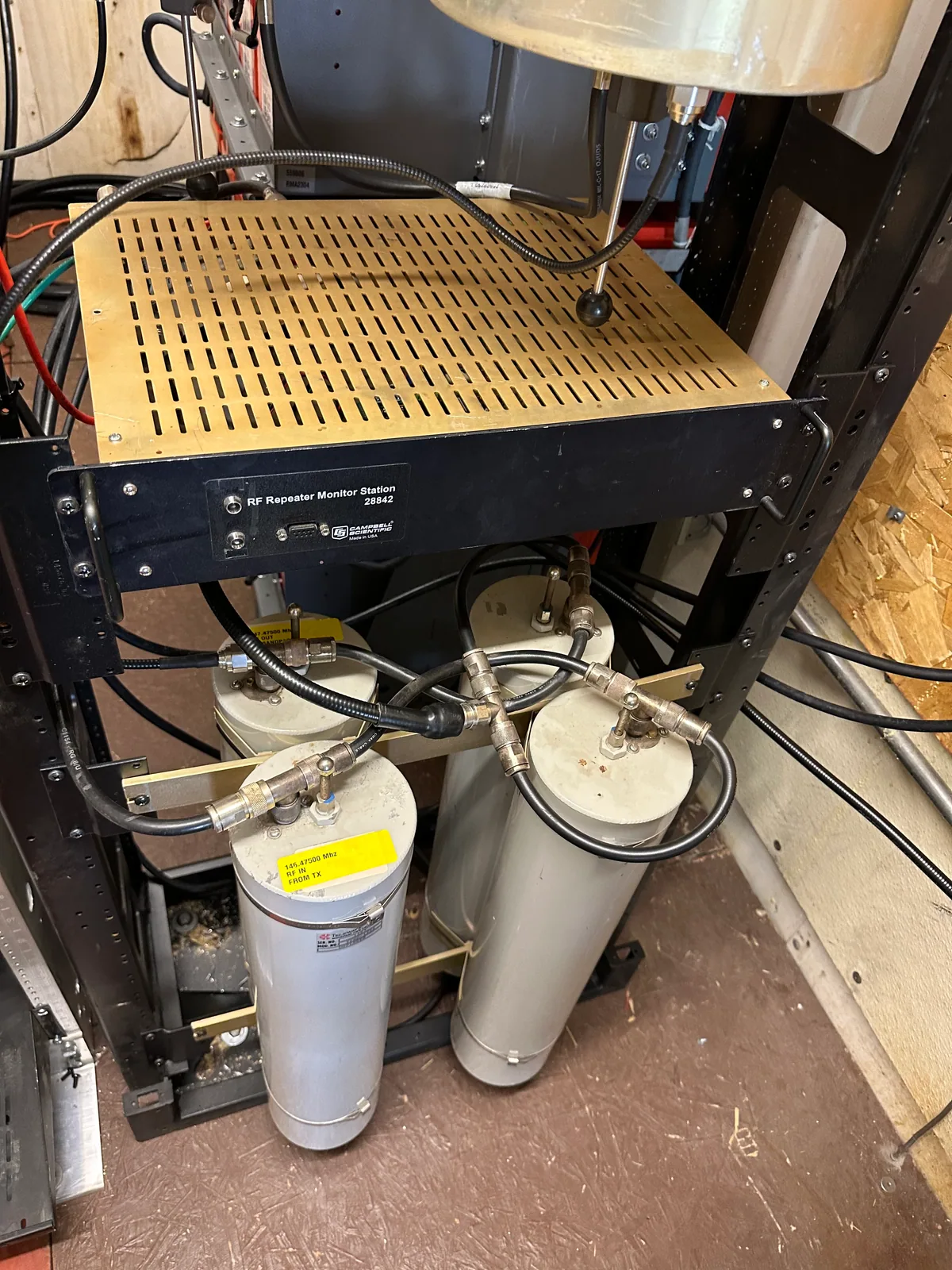 Close view of repeater RF filtering cavities and monitor station cabling